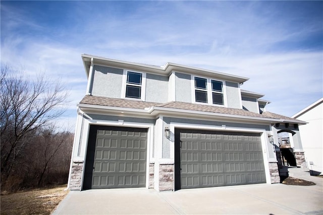 view of front of property featuring a garage