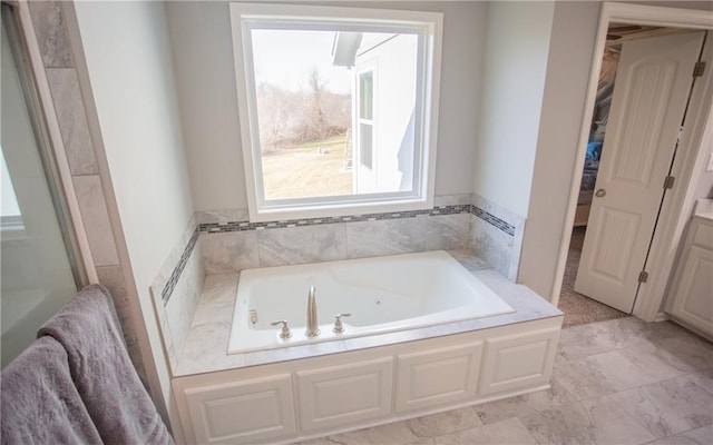 bathroom featuring a bath