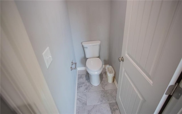 bathroom featuring toilet