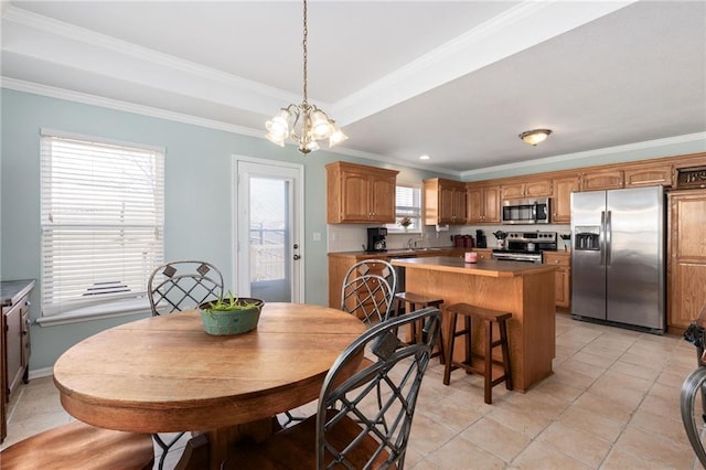 dining room featuring light tile patterned floors, a notable chandelier, and ornamental molding