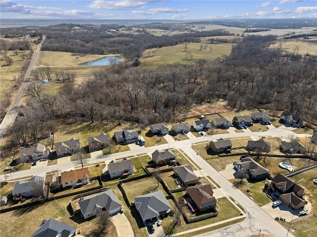 aerial view with a residential view and a water view