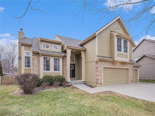 view of front of property with a garage and a front lawn