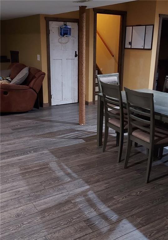 dining room with hardwood / wood-style floors