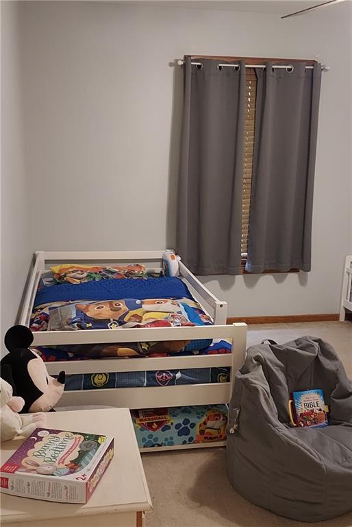 bedroom featuring carpet flooring