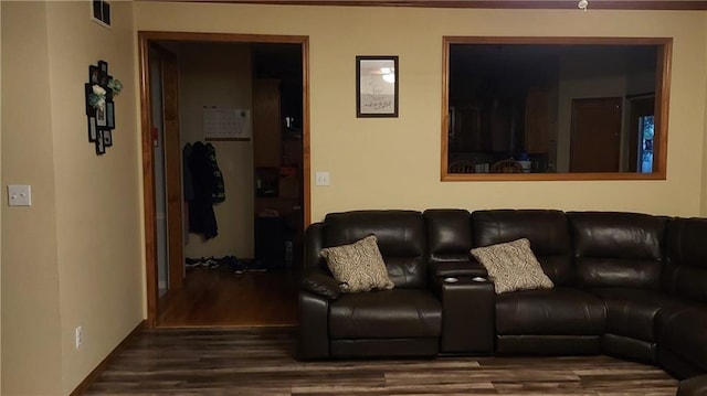 living room with dark hardwood / wood-style flooring