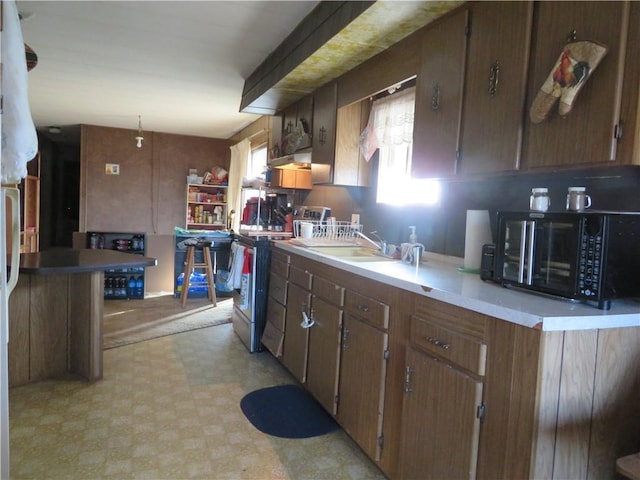 kitchen featuring sink and stainless steel electric stove