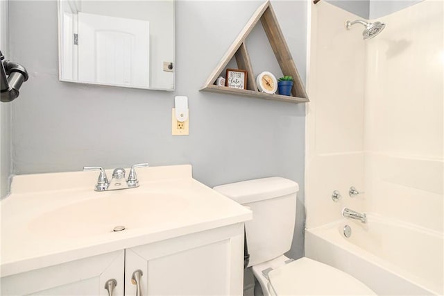 full bathroom featuring shower / tub combination, vanity, and toilet