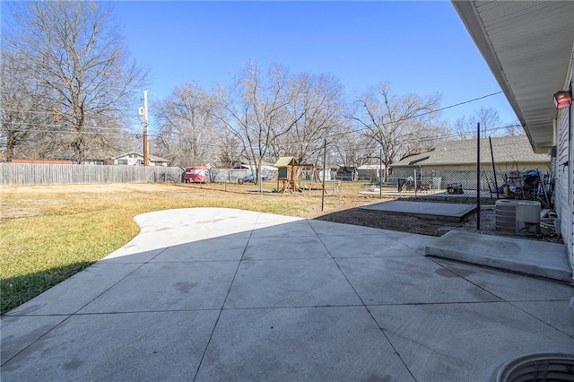 view of patio / terrace with a playground and central air condition unit