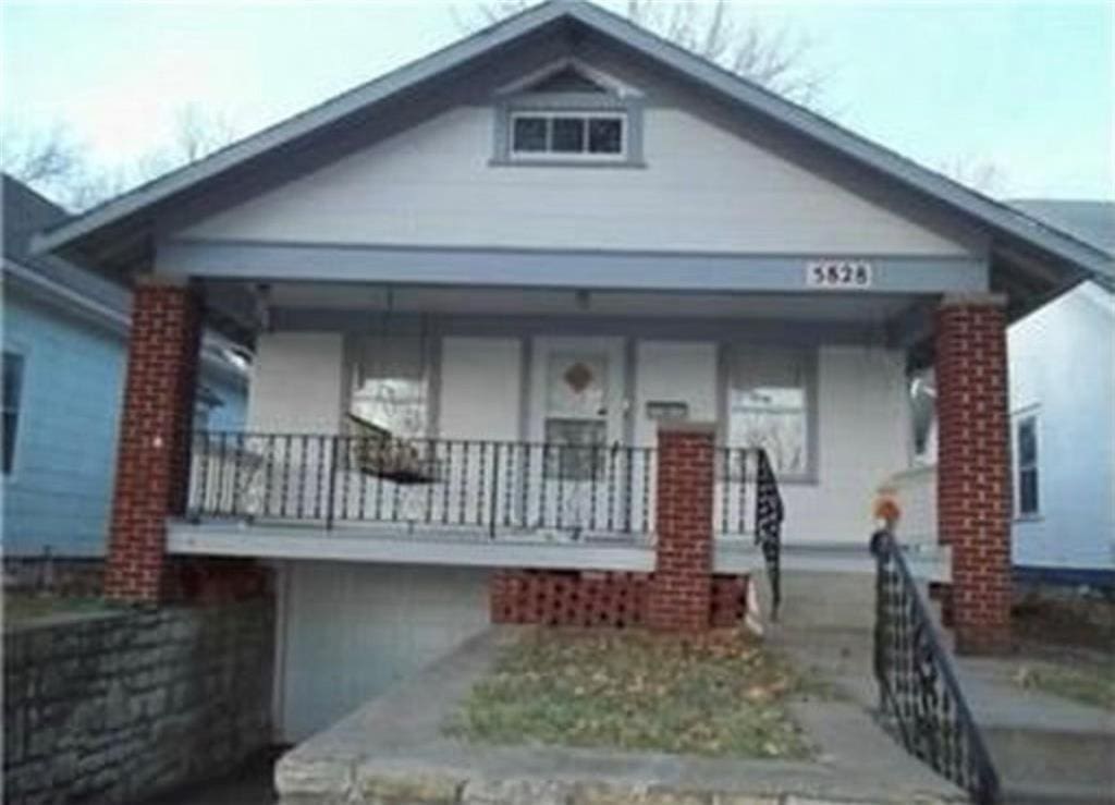 bungalow-style home with a porch