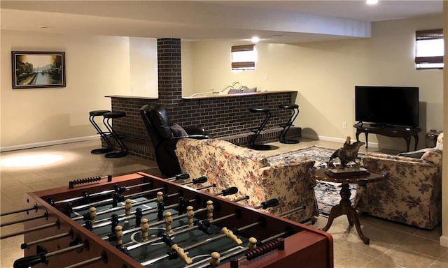 living room with tile patterned flooring