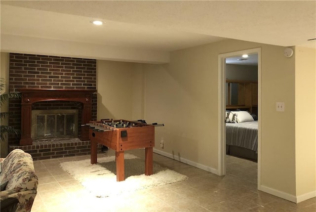 playroom with a fireplace