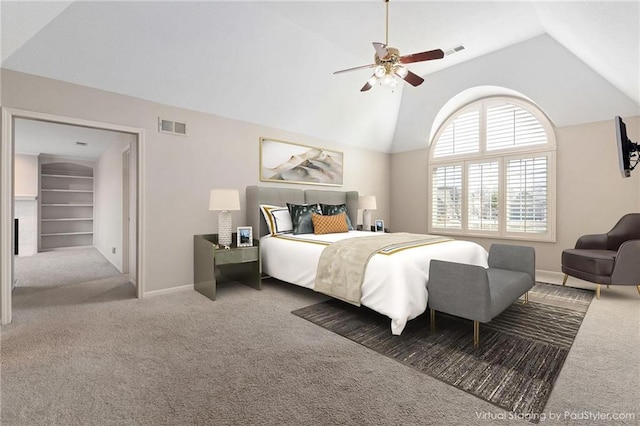 bedroom featuring visible vents, baseboards, lofted ceiling, carpet flooring, and a ceiling fan