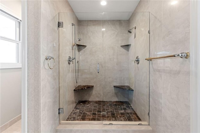 bathroom featuring a stall shower