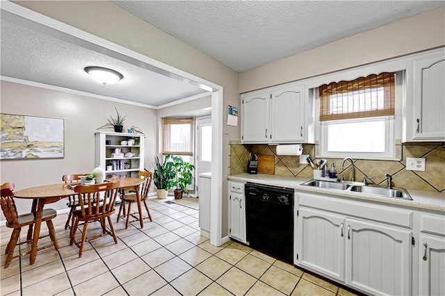 kitchen featuring sink, decorative backsplash, white cabinets, and black dishwasher