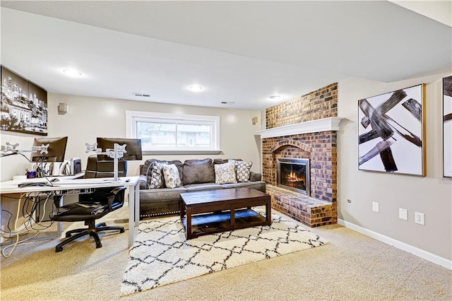 living room featuring carpet floors and a fireplace