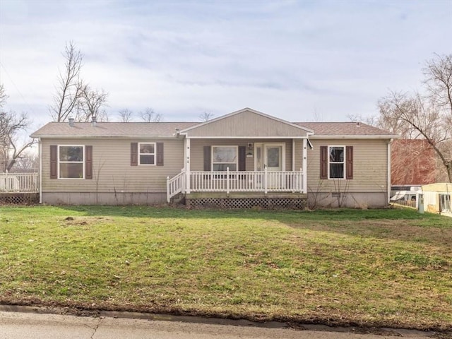 view of front facade featuring a porch and a front yard