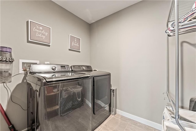 laundry area featuring independent washer and dryer