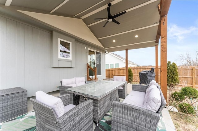 view of patio featuring ceiling fan and an outdoor living space