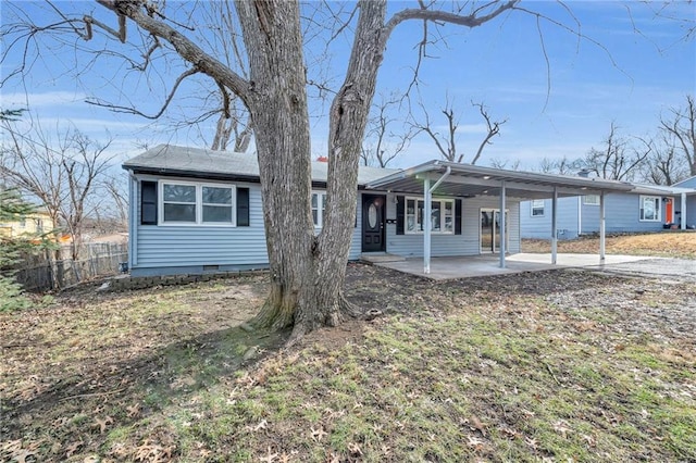 view of front of property featuring a patio