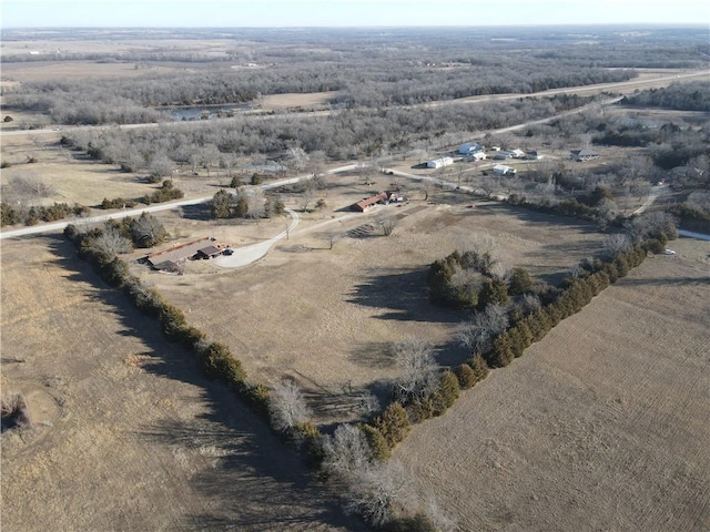 birds eye view of property featuring a rural view