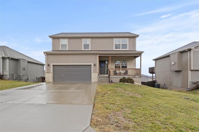 front facade with cooling unit, a garage, a front yard, and covered porch