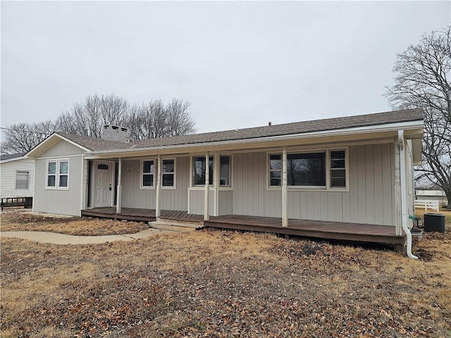 view of front of house featuring central AC and covered porch