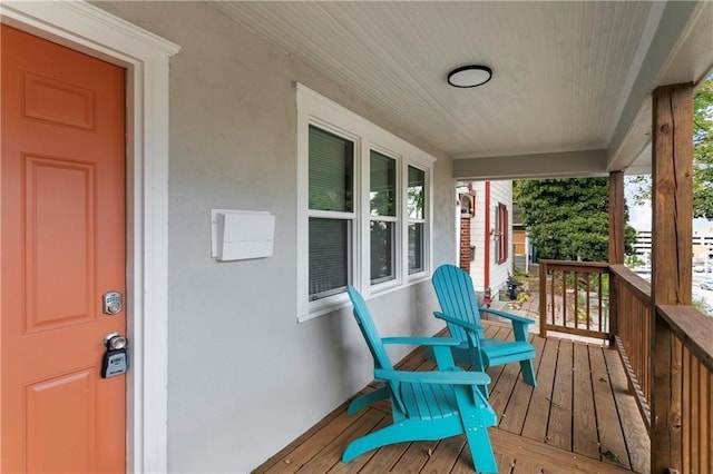 wooden deck featuring a porch