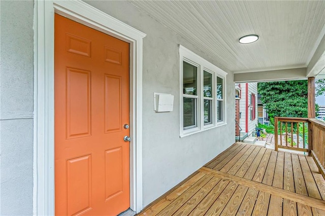 doorway to property with covered porch