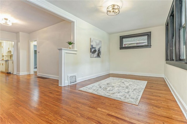 entrance foyer featuring hardwood / wood-style floors