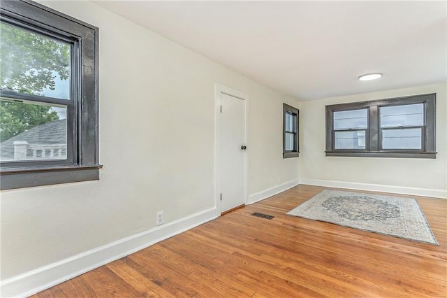 entrance foyer with hardwood / wood-style floors