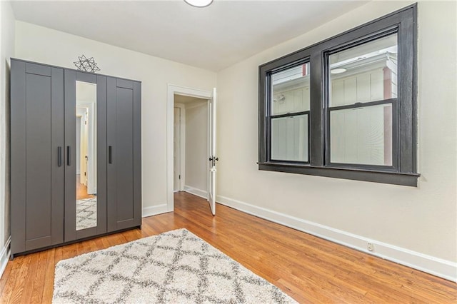 foyer entrance featuring hardwood / wood-style flooring