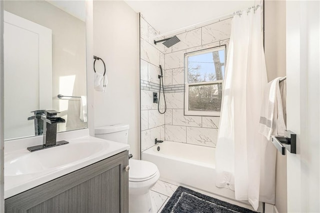 full bathroom with vanity, toilet, and shower / bath combo