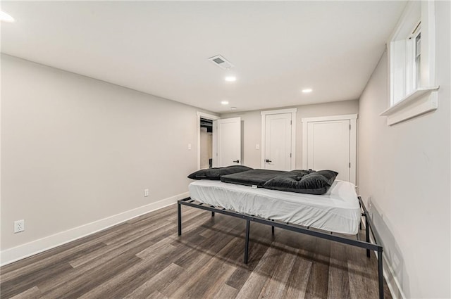 bedroom with wood-type flooring