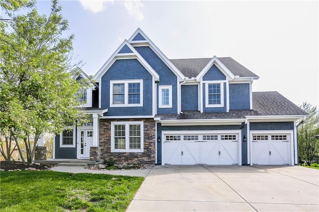 9609 NE 96th Ter, Kansas City, MO 64157 - craftsman-style home featuring stucco siding, an attached garage, driveway, stone siding, and a front yard