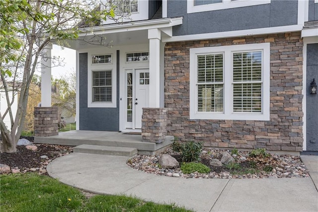 9609 NE 96th Ter, Kansas City, MO 64157 - property entrance featuring stucco siding and stone siding