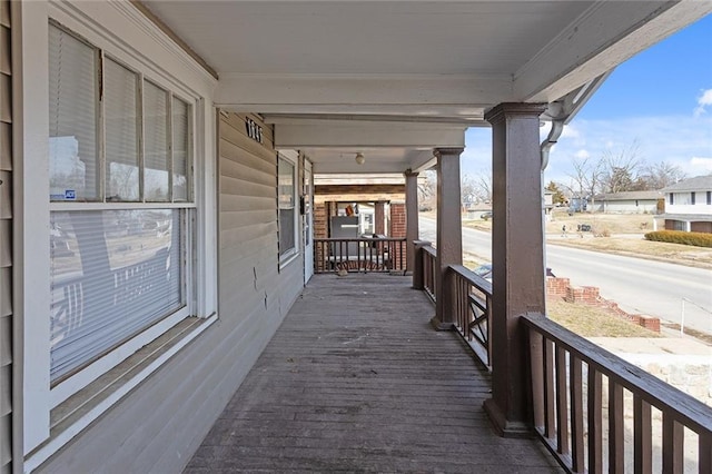 wooden terrace with covered porch