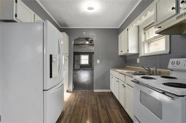 kitchen featuring sink, white appliances, ornamental molding, white cabinets, and dark hardwood / wood-style flooring