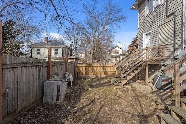 view of yard featuring central AC