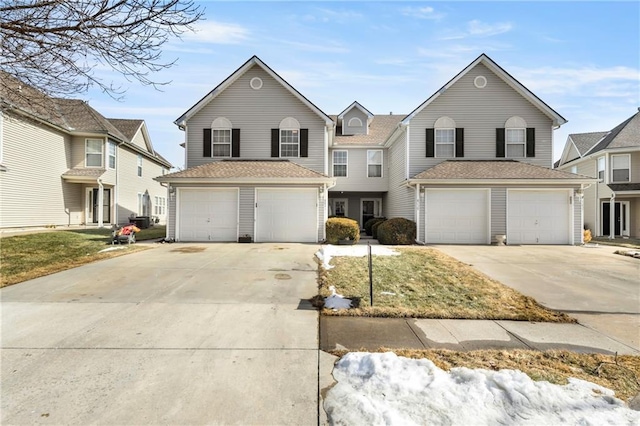 traditional-style home with concrete driveway