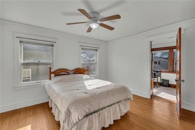 bedroom featuring ceiling fan and wood-type flooring