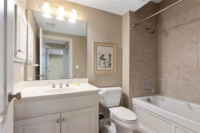 full bath featuring visible vents, shower / bathing tub combination, vanity, and toilet