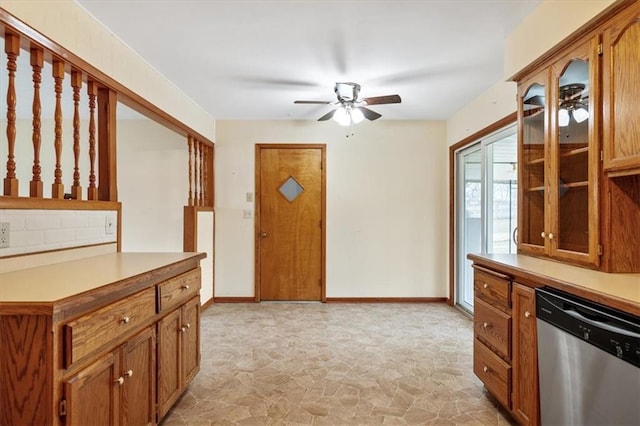 kitchen featuring ceiling fan and stainless steel dishwasher