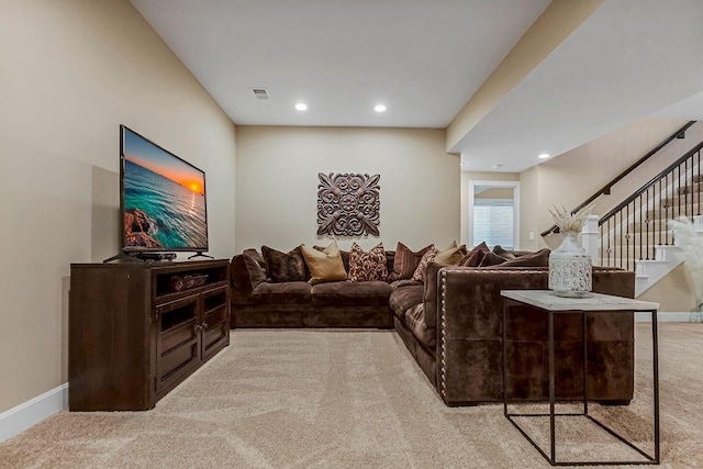 living room featuring light colored carpet