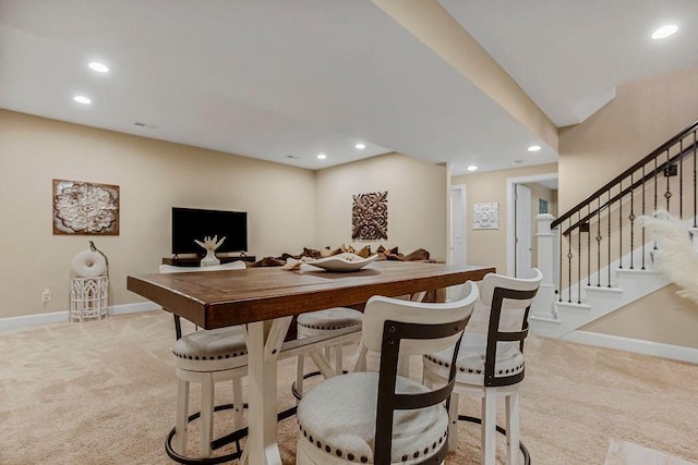 view of carpeted dining room