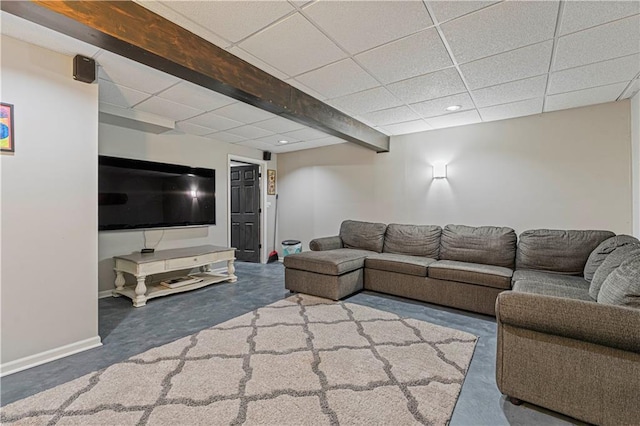 living room featuring beam ceiling and a paneled ceiling