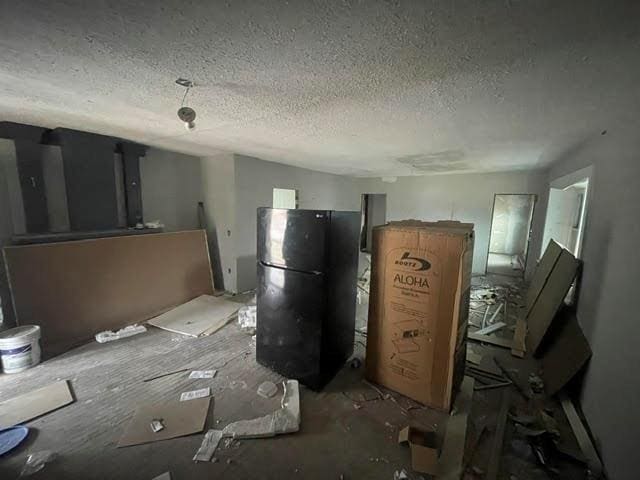 misc room featuring a textured ceiling