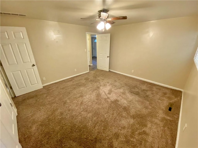 unfurnished bedroom with ceiling fan and carpet floors