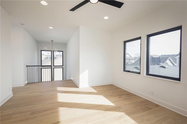 spare room featuring light wood-type flooring