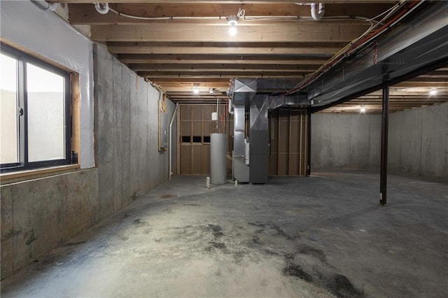 basement with heating unit and gas water heater