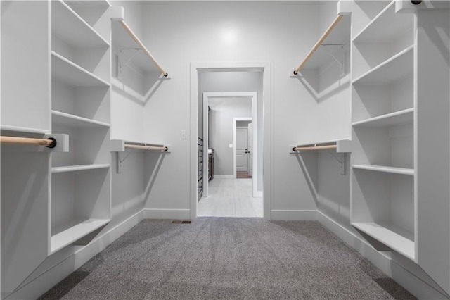 17178 S Heatherwood St, Olathe, KS 66062 - walk in closet with carpet flooring